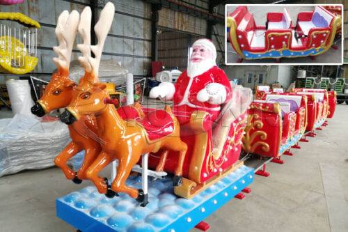 Tren eléctrico navideño con trineo